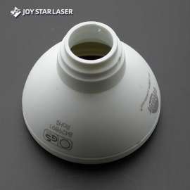 Laser marking of lighting cap